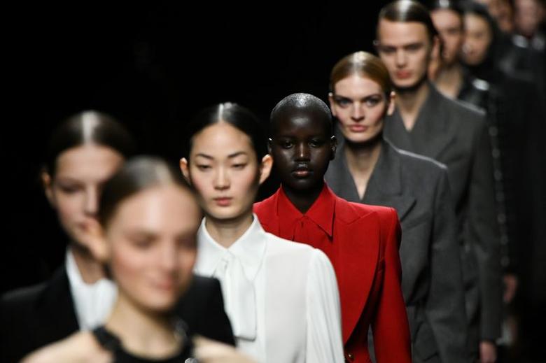 FILE PHOTO: Models present creations from the Michael Kors Fall/Winter 2020 collection during fashion week in New York, U.S., February 12, 2020. REUTERS/Idris Solomon

