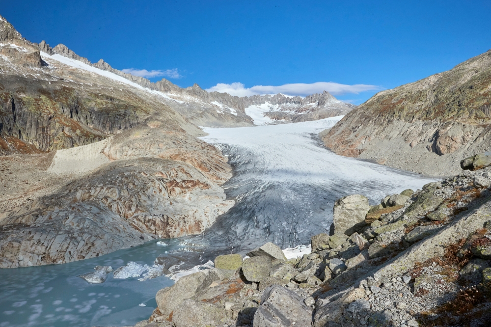 The Rhone glacier and the source of the Rhone river are seen on an autumn day in Obergoms, Switzerland, October 25, 2021. REUTERS/Denis Balibouse/File Photo
 