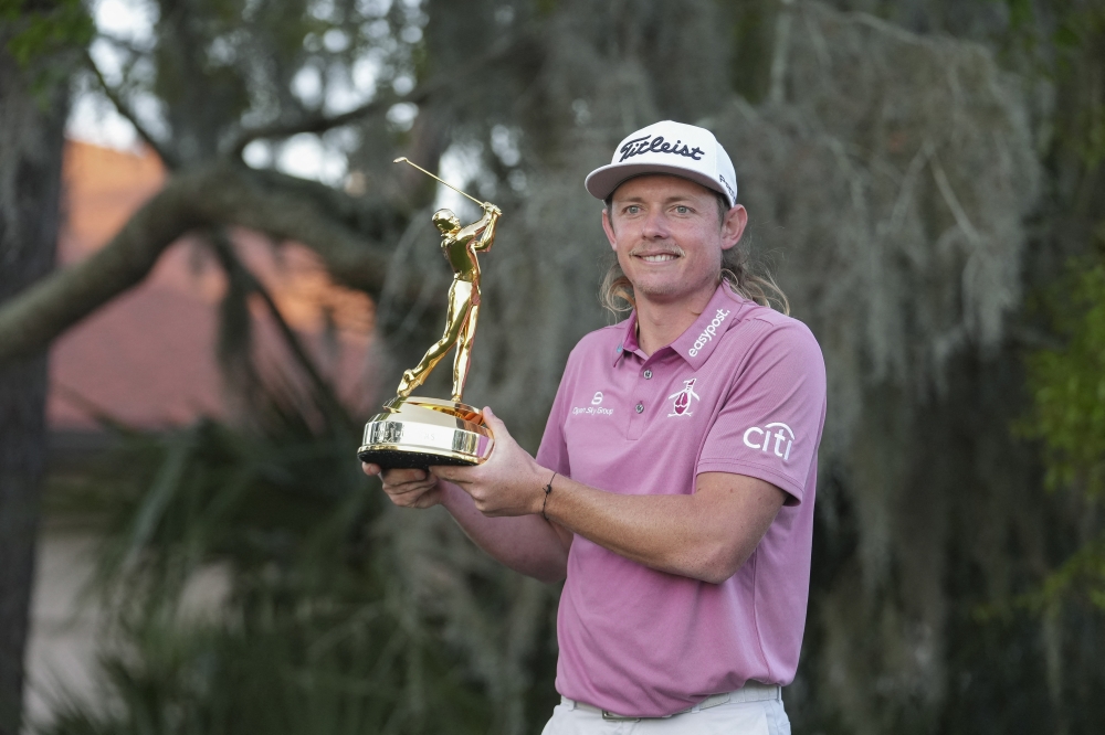 Cameron Smith displays the champions trophy after winning The Players Championship golf tournament at TPC Sawgrass. Mandatory Credit: David Yeazell-USA TODAY Sports
