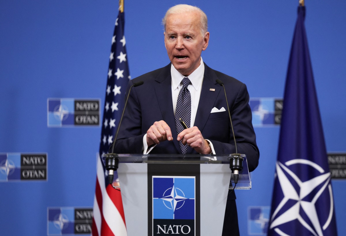 U.S. President Joe Biden speaks during a news conference in the framework of a European Union leaders summit amid Russia's invasion of Ukraine, in Brussels, Belgium March 24, 2022. REUTERS/Evelyn Hockstein
