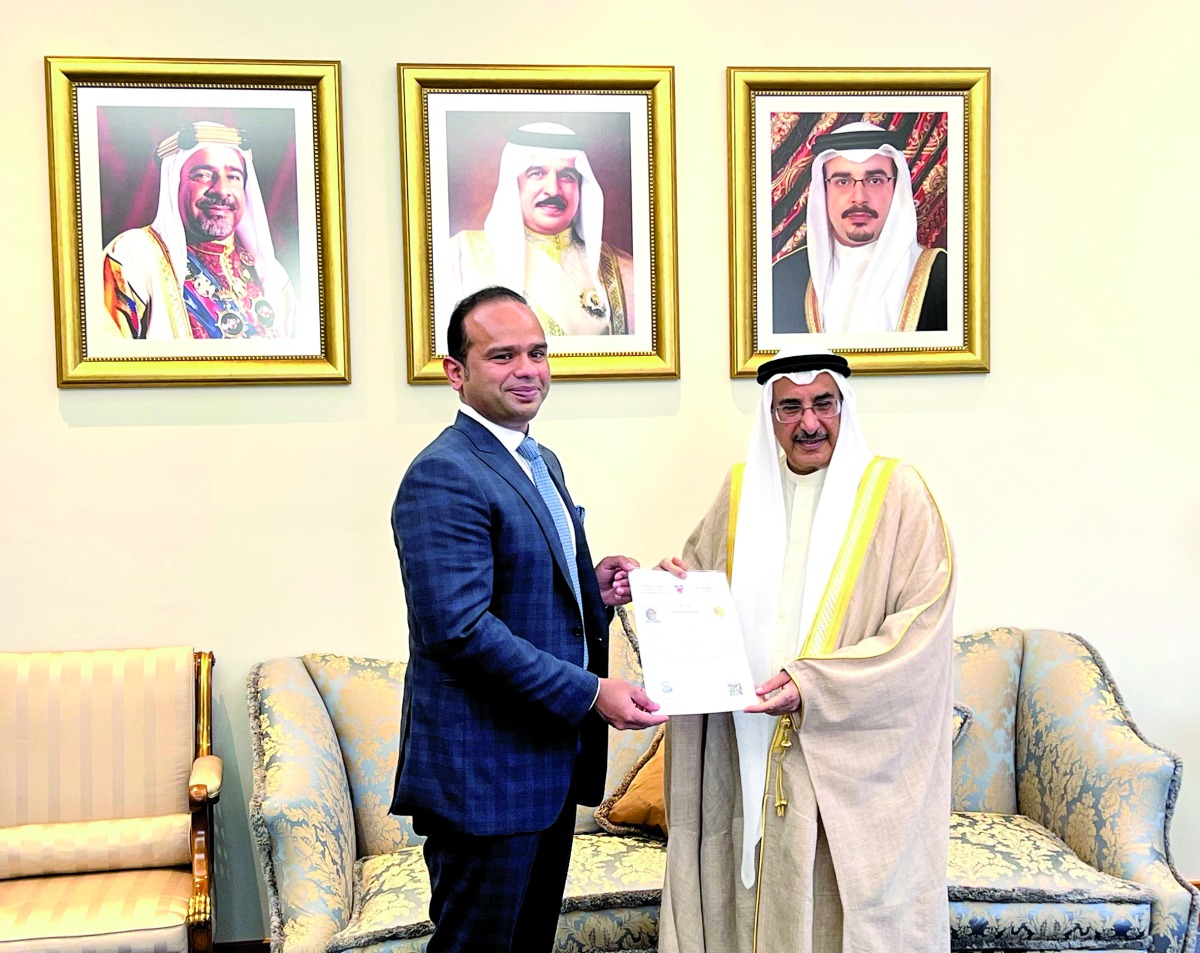 Deputy Prime Minister of Bahrain H E Shaikh Khalid bin Abdulla Al Khalifa awarding the Bahrain golden residency visa to Adeeb Ahamed. 