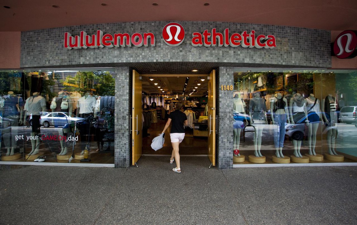 A woman walks into a store of yogawear retailer Lululemon Athletica in downtown Vancouver June 11, 2014. Reuters/Ben Nelms

