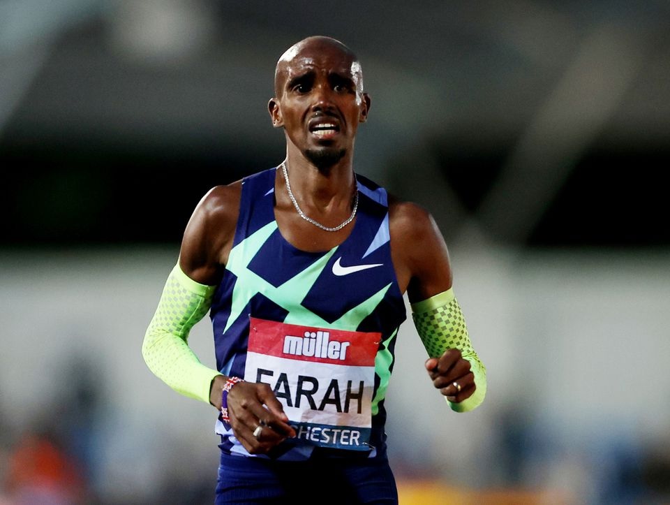 June 25, 2021 Britain's Mo Farah reacts after the Men's 10,000m as he fails to qualify for the 10,000m at the Tokyo Olympics Action Images via Reuters/Molly Darlington

