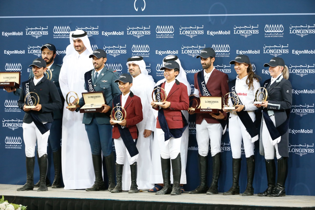 Overall title winners of the fifth edition of the Longines Hathab Qatar Equestrian Tour pose with Qatar Equestrian and Modern Pentathlon Federation President Bader Mohamed Al Darwish, Salam International Chief Executive Officer Abdulsalam Abu Issa, and ExxonMobil Qatar Facilities Advisor Rashid Al Hajiri after the final round at Al Shaqab’s outdoor arena yesterday.