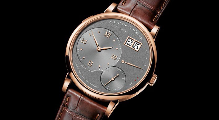 The GRAND LANGE 1 with a grey dial is available in white or pink gold.