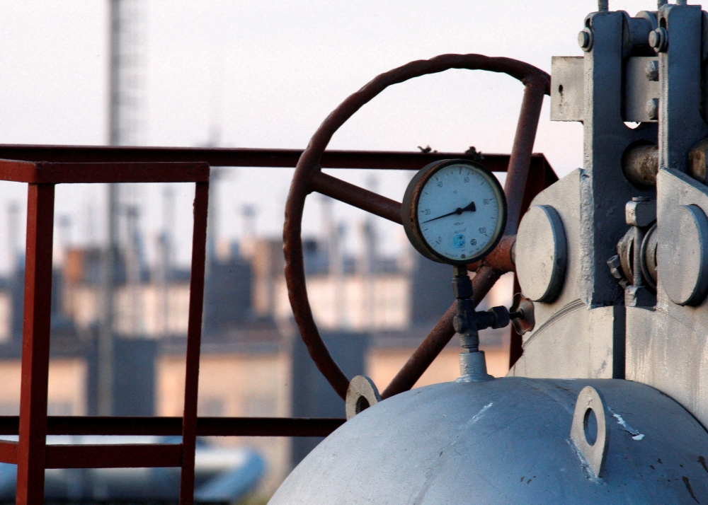 FILE PHOTO: Pipes and pressure gauges are seen at a gas pumping station at Ukrainian settlement of Orlovka, about 280 km (174 miles) west of the Black Sea port of Odessa, January 13, 2009. REUTERS/ Gleb Garanich/File Photo