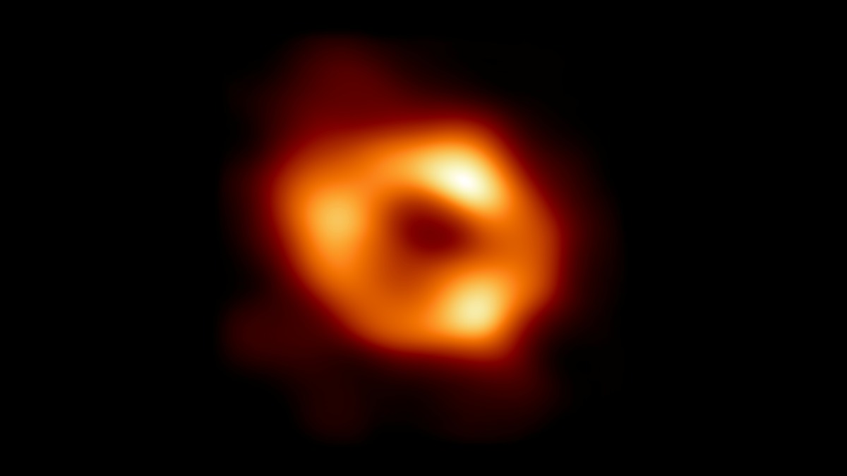 This is the first image of Sagittarius A* (or Sgr A* for short), the supermassive black hole at the center of our galaxy. It was captured by the Event Horizon Telescope (EHT), an array which linked together radio observatories across the planet to form a single 