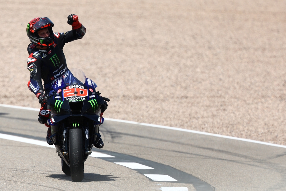 Monster Energy Yamaha MotoGP's Fabio Quartararo celebrates after winning the race. Reuters/Lisi Niesner