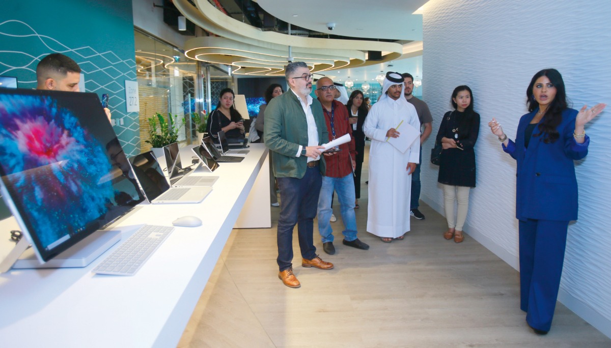 General Manager of Microsoft Qatar Lana Khalaf explains the smart features of the new Microsoft office, during a media tour at Burj Al Fardan in Lusail City, yesterday. PIC: Mohamed Farag