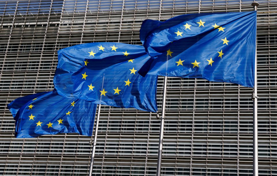 European Union flags flutter outside the EU Commission headquarters in Brussels, Belgium June 17, 2022. REUTERS/Yves Herman/File Photo/File Photo

