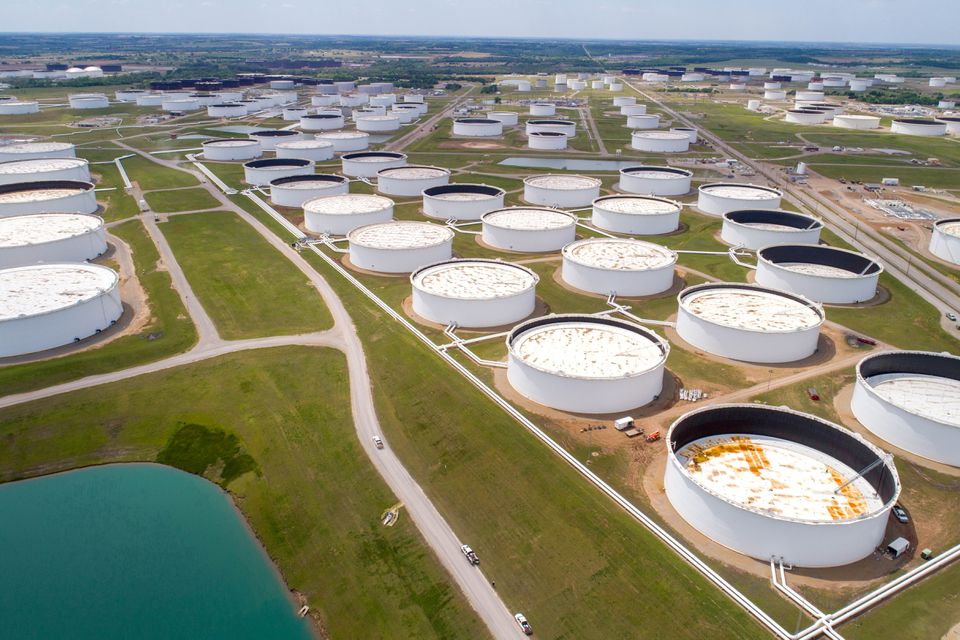 Crude oil storage tanks are seen in an aerial photograph at the Cushing oil hub in Cushing, Oklahoma, U.S. April 21, 2020. REUTERS/Drone Base