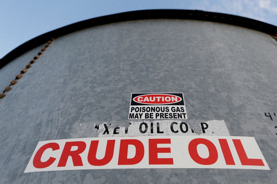 Sticker reads crude oil on the side of a storage tank in the Permian Basin in Mentone, Loving County, Texas, U.S. November 22, 2019. REUTERS/Angus Mordan