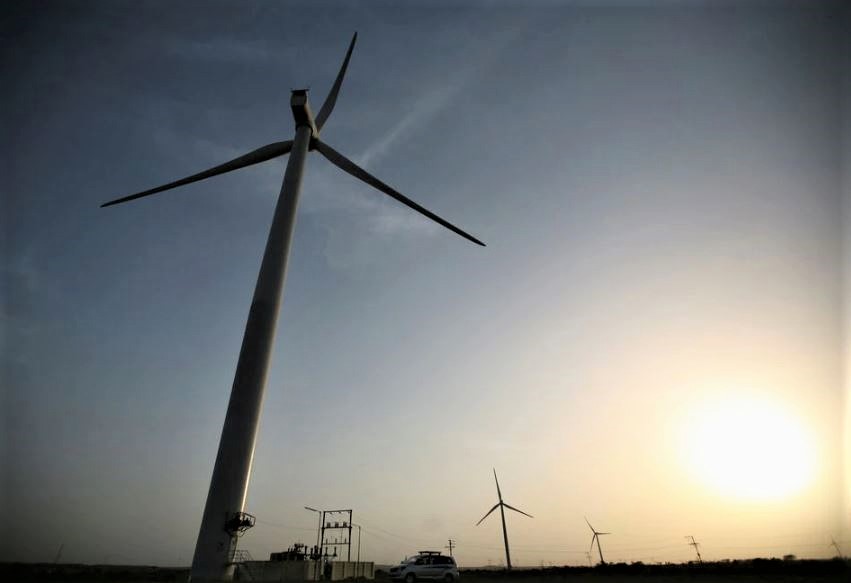 File Photo: Power-generating windmill turbines are pictured during the inauguration ceremony of the new 25 MW ReNew Power wind farm at Kalasar village in the western Indian state of Gujarat on May 6, 2012. (REUTERS/Amit Dave)

