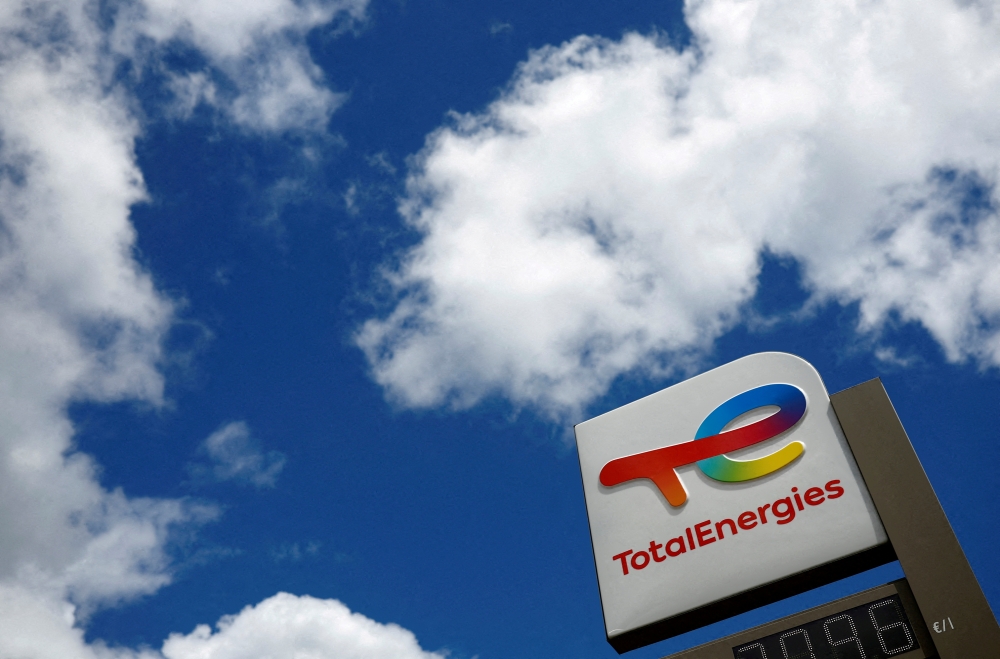 A sign with the logo of French oil and gas company TotalEnergies is pictured at a petrol station in Nantes, France, June 30, 2022. (REUTERS/Stephane Mahe)