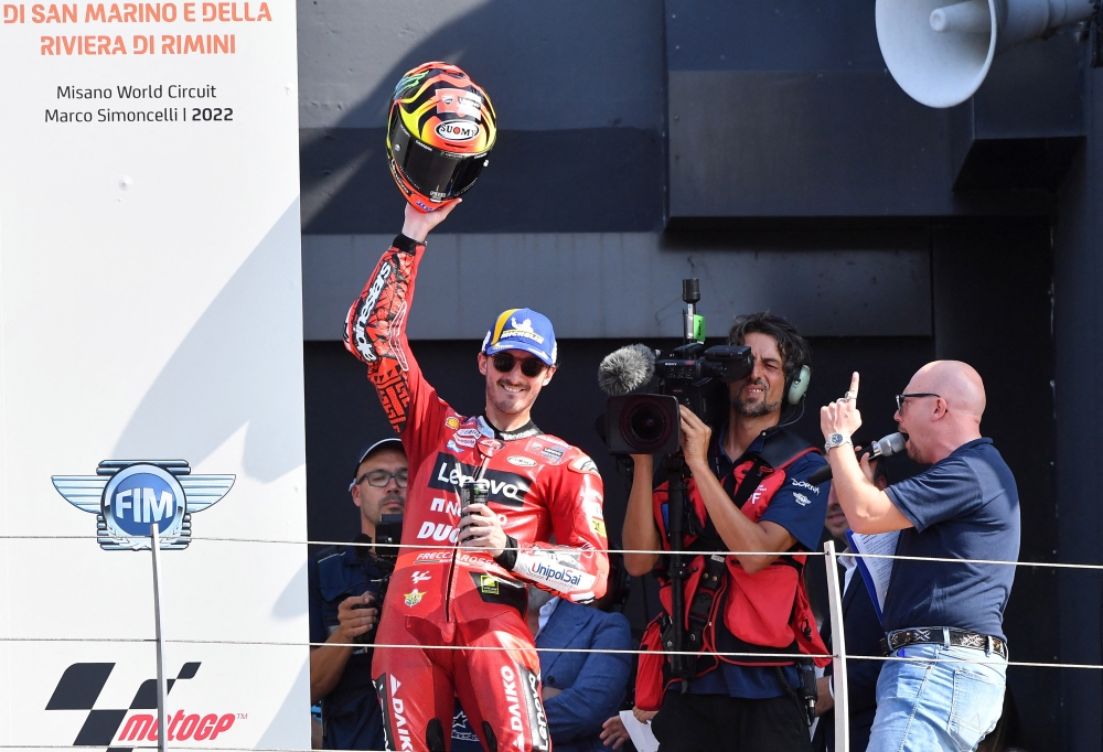 Ducati Lenovo's Francesco Bagnaia celebrates on the podium after winning the MotoGP race of the San Marino Grand Prix at the Misano World Circuit Marco Simoncelli, Misano Adriatico, San Marino, on September 4, 2022. REUTERS/Jennifer Lorenzini