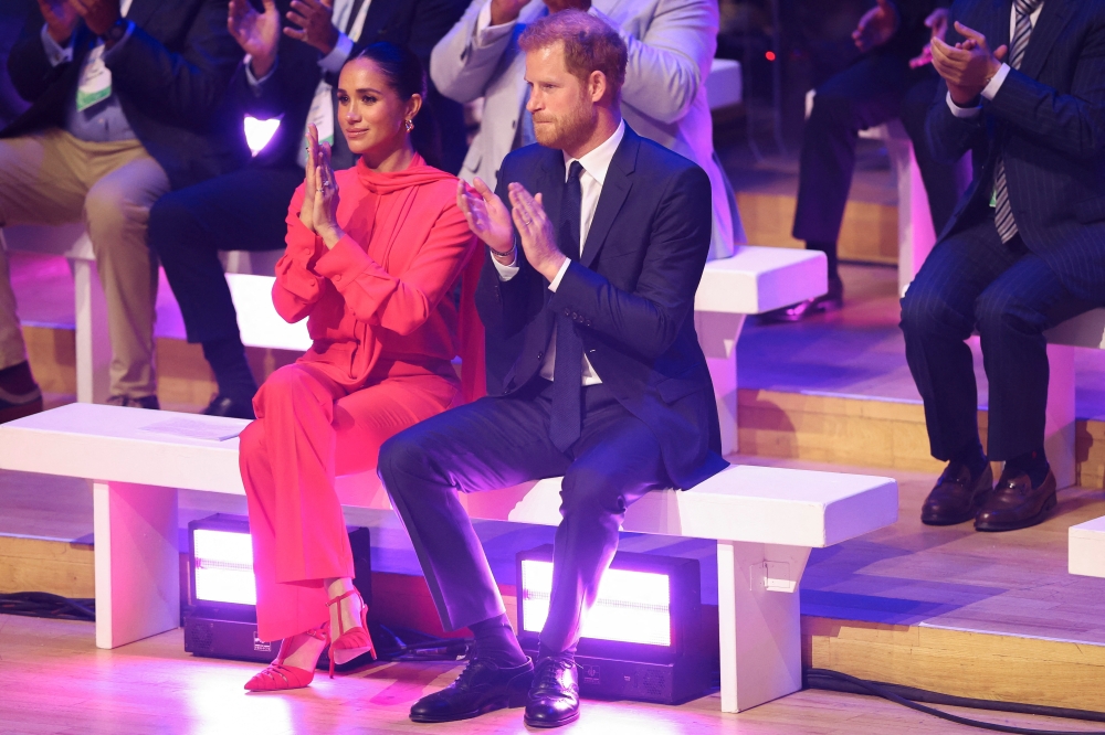 Britain's Prince Harry and Meghan, Duchess of Sussex attend the opening ceremony of the One Young World summit, in Manchester, on September 5, 2022. REUTERS/Molly Darlington
 