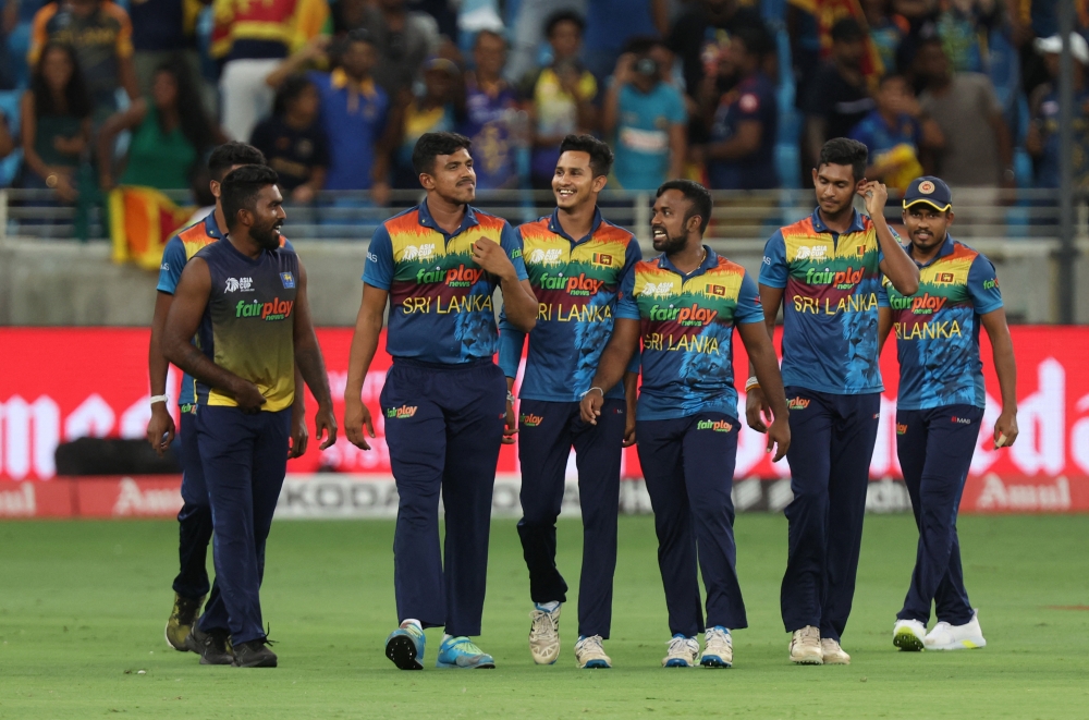 Sri Lanka celebrate after winning their Asian Cup match against India at the Dubai International Cricket Stadium, Dubai, on September 6, 2022.   REUTERS/Christopher Pike