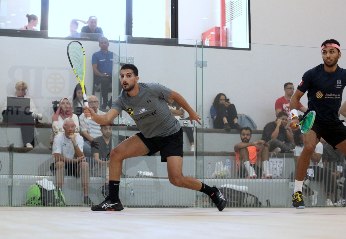 Qatar's Adbulla Mohamed Al Tamimi (right) and Egypt's Mazen Hesham in action during yesterday's match. Pic: PSA