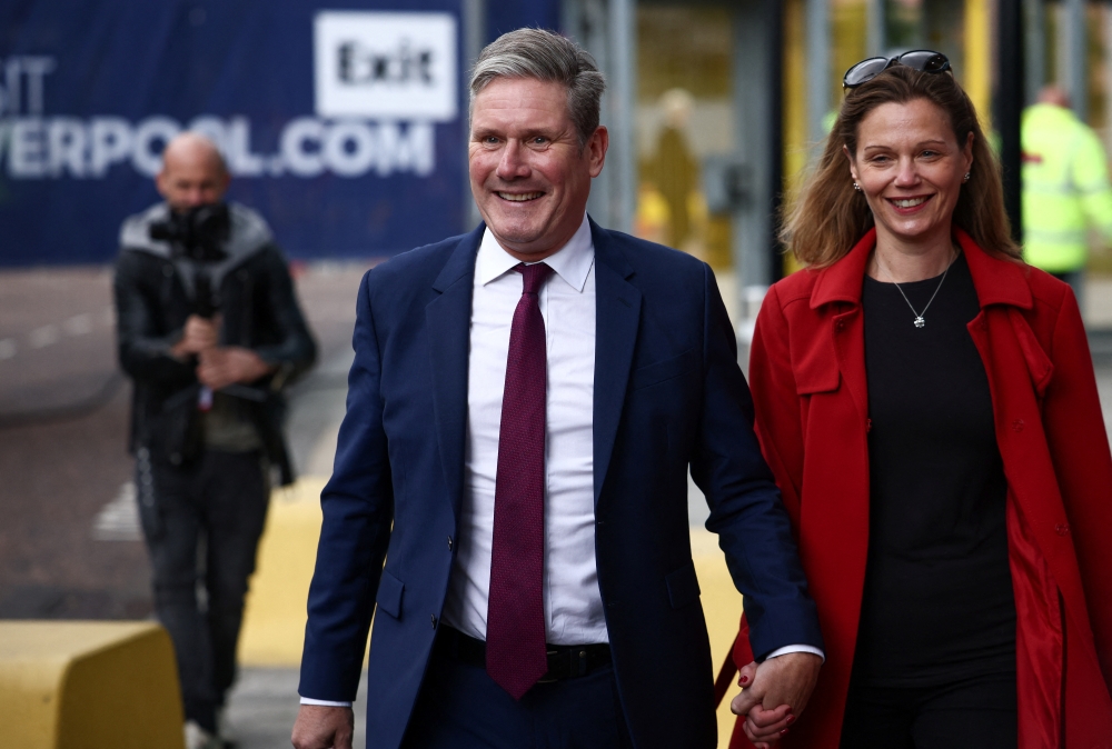 British leader of the Labour Party Kier Starmer arrives at a hotel with his wife Victoria ahead of the Labour Party Conference in Liverpool, Britain, September 24, 2022. Reuters/Henry Nicholls