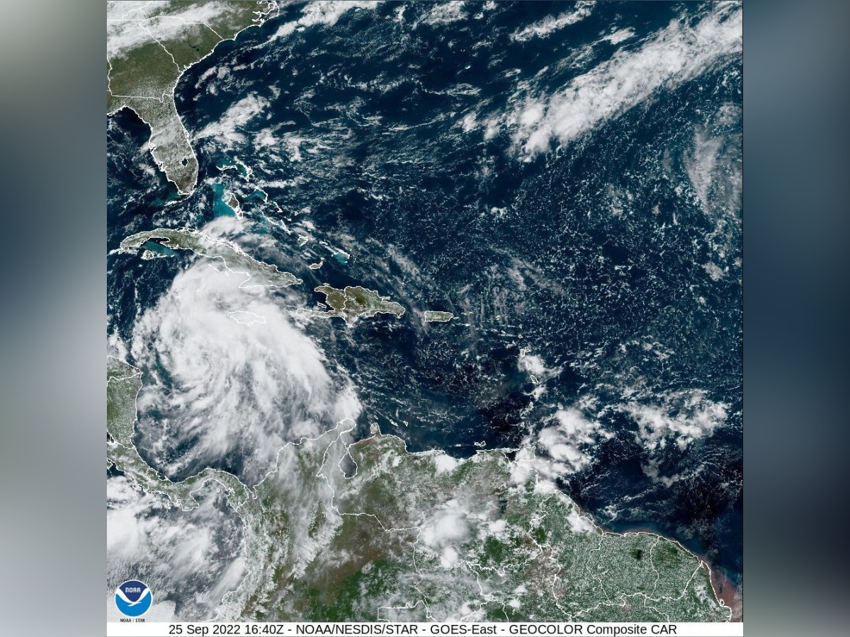 Tropical Storm Ian is seen near the coast of Cuba in this satellite image taken September 25, 2022. National Oceanic and Atmospheric Administration (NOAA)/Handout via Reuters