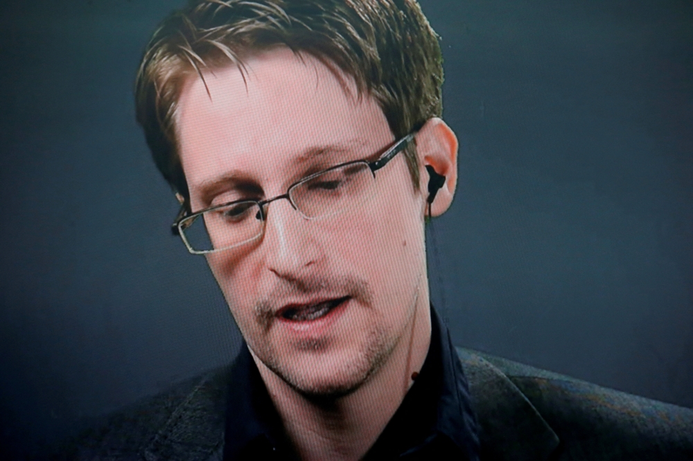 File Photo: Edward Snowden speaks via video link during a news conference in New York City, US, on September 14, 2016. (REUTERS/Brendan McDermid)