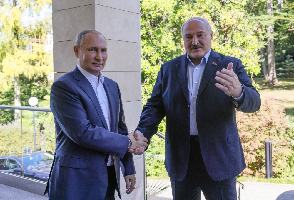 Russian President Vladimir Putin greets his Belarusian counterpart Alexander Lukashenko during a meeting in Sochi, Russia, on September 26, 2022. Sputnik/Gavriil Grigorov/Pool via REUTERS 