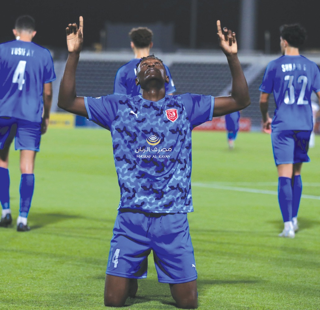 Al Duhail's Micheal Olunga celebrates after scoring a hat-trick.