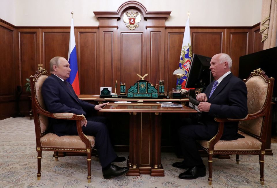 Russian President Vladimir Putin meets with Rostec CEO Sergey Chemezov in Moscow, Russia, on May 18, 2022. File Photo / Reuters
