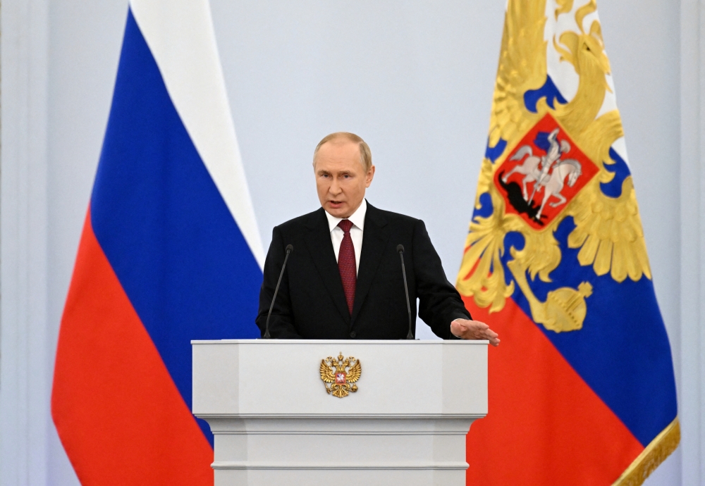 Russian President Vladimir Putin delivers a speech during a ceremony to declare the annexation of the Russian-controlled territories of four Ukraine's Donetsk, Luhansk, Kherson and Zaporizhzhia regions, after holding what Russian authorities called referendums in the occupied areas of Ukraine that were condemned by Kyiv and governments worldwide, in the Georgievsky Hall of the Great Kremlin Palace in Moscow, Russia, September 30, 2022. Sputnik/Grigory Sysoyev/Kremlin via REUTERS