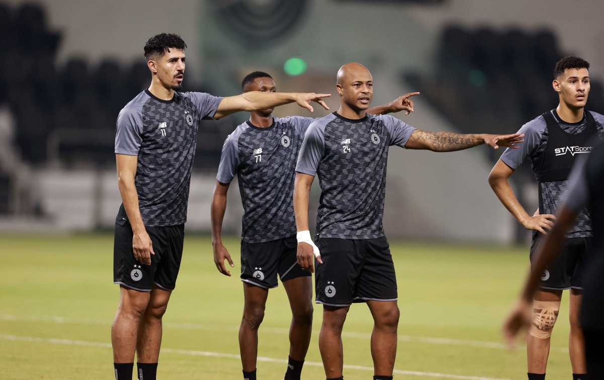 Al Sadd's players during a training session yesterday.