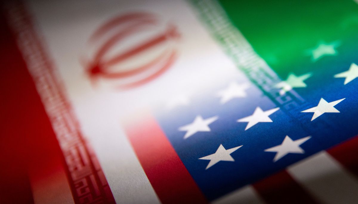 Iran and US flags are seen printed on paper in this illustration taken January 27, 2022. (REUTERS/Dado Ruvic)