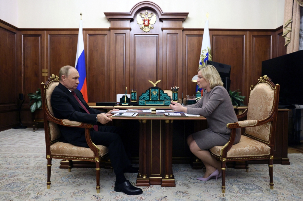 Russian President Vladimir Putin attends a meeting with Culture Minister Olga Lyubimova in Moscow on October 3, 2022. Sputnik/Gavriil Grigorov/Kremlin via REUTERS 