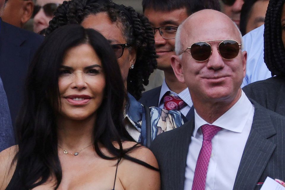 Amazon founder Jeff Bezos and Lauren Sanchez attend the Commencement ceremony at the Massachusetts Institute of Technology (MIT) in Cambridge, Massachusetts, US, on May 27, 2022. File Photo / Reuters
