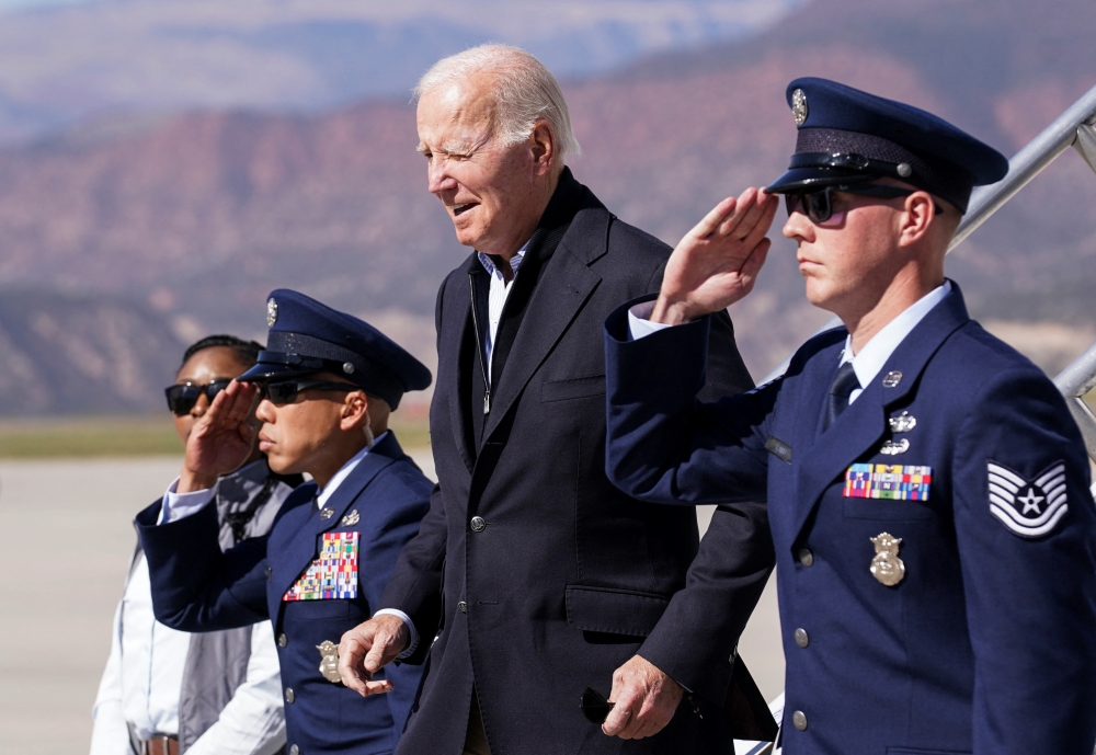 US President Joe Biden disembarks from Air Force One as he arrives at Eagle County Regional Airport in Gypsum, Colorado, US, on October 12, 2022. REUTERS/Kevin Lamarque