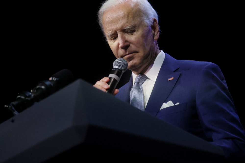 US President Joe Biden delivers a speech during an event hosted by the Democratic National Committee (DNC) at the Howard Theatre in Washington, US, on October 18, 2022. REUTERS/Leah Millis