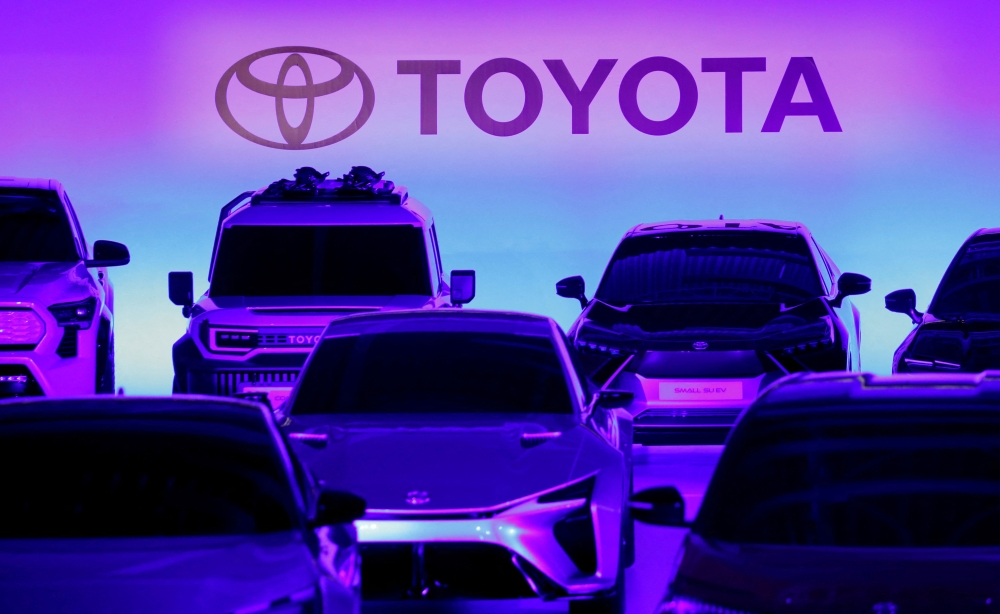 Toyota Motor Corporation's cars are seen at a briefing on the company's strategies on battery EVs in Tokyo, Japan December 14, 2021. REUTERS/Kim Kyung-Hoon/File Photo