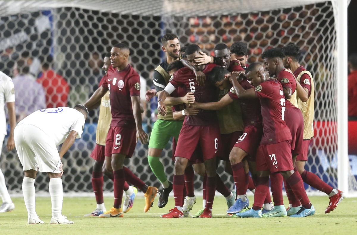 Qatar players celebrate after defeating Honduras during the 2021 CONCACAF Gold Cup, in this file photo.