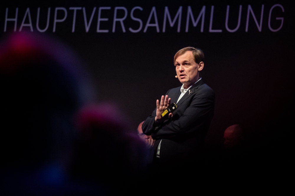 In this file photo taken on April 18, 2019 Bjorn Gulden, then Chairman of the Board of Puma, the sporting goods manufacturer, speaks at the company's Annual General Meeting in Herzogenaurach, southern Germany.(Photo by Daniel Karmann / dpa / AFP) / Germany OUT