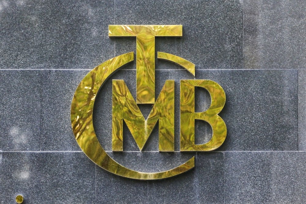 The logo of Turkey's Central Bank is pictured at the entrance of its headquarters in Ankara on October 15, 2021.  File Photo / Reuters
