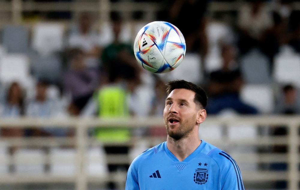 Argentina's forward Lionel Messi controls a ball during a training camp in Abu Dhabi ahead of the Qatar 2022 FIFA football World Cup, at the Nahyan Stadium, on November 14, 2022. Photo by Karim Sahib / AFP