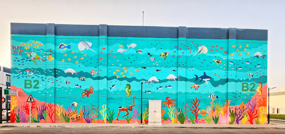 A wall mural painted by mixed media artist Mallika Jaiswal, Business Support Officer at the College of Health and Life Sciences at Hamad Bin Khalifa University.