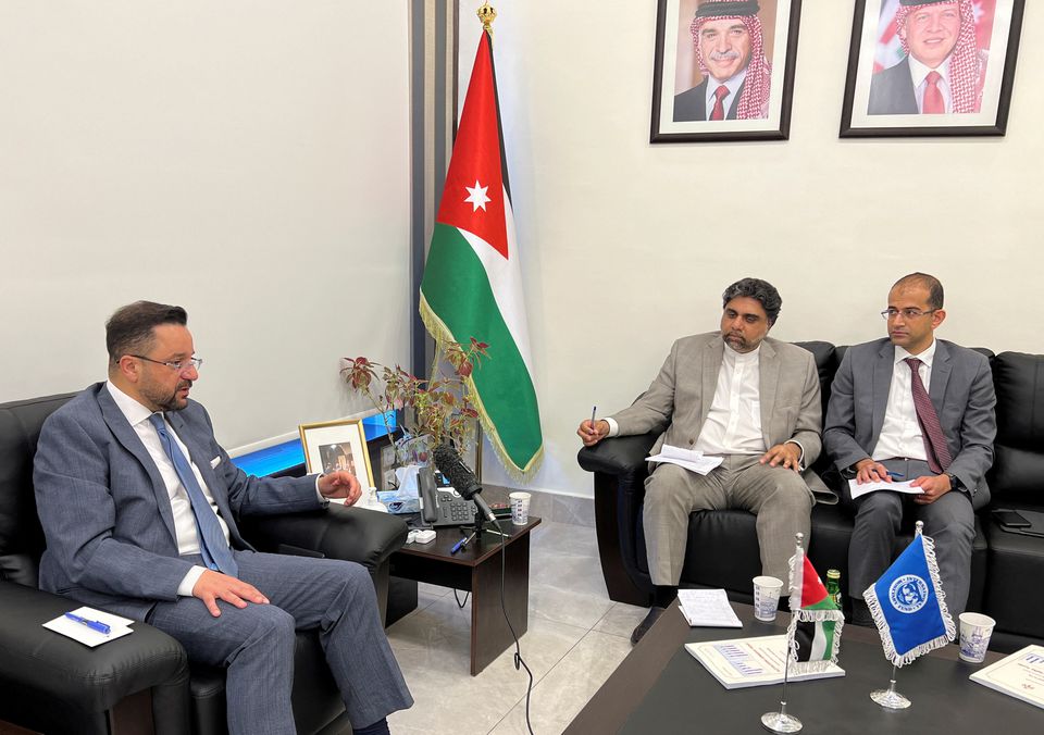 Jordan's Finance Minister Mohamad al Ississ meets with Ali Abbas, who headed an International Monetary Fund mission to Jordan, in Amman, Jordan, May 24, 2022. (REUTERS/Jehad Shelbak)