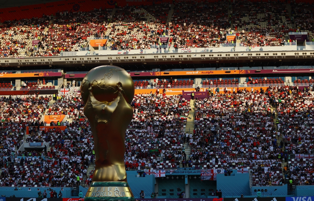 November 21, 2022 General view of a FIFA World Cup giant replica trophy on the pitch before the match REUTERS/Hannah Mckay 