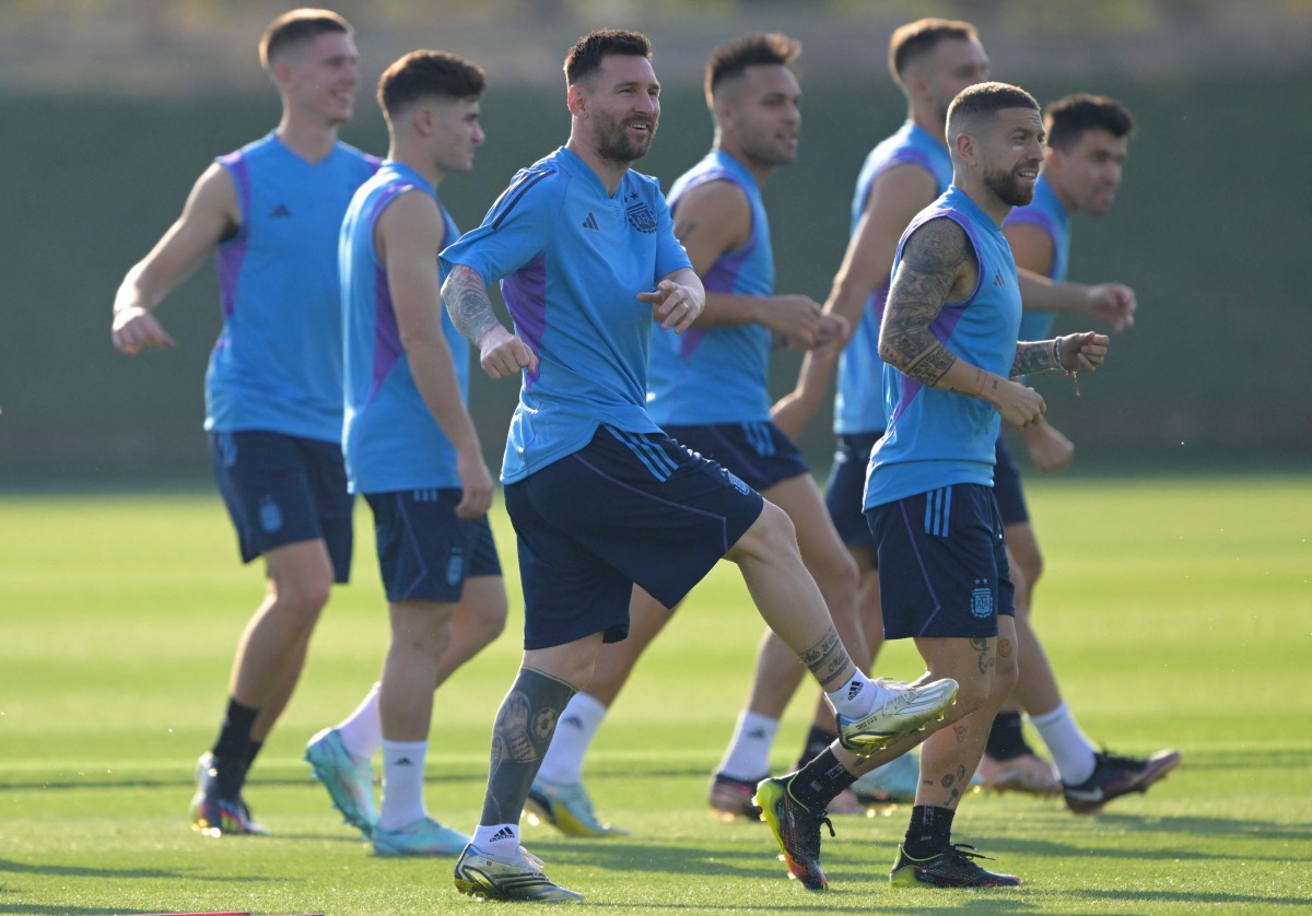 Argentina’s Lionel Messi trains with team-mates at the Qatar University Training Site, yesterday. AFP