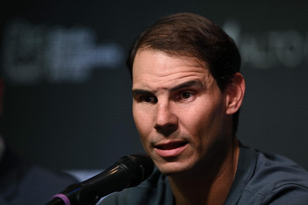 Spanish tennis player Rafael Nadal speaks during a press conference on November 22, 2022 in Buenos Aires, Argentina, on the eve of the exhibition match against Norwegian tennis player Casper Ruud. (Photo by Luis ROBAYO / AFP)