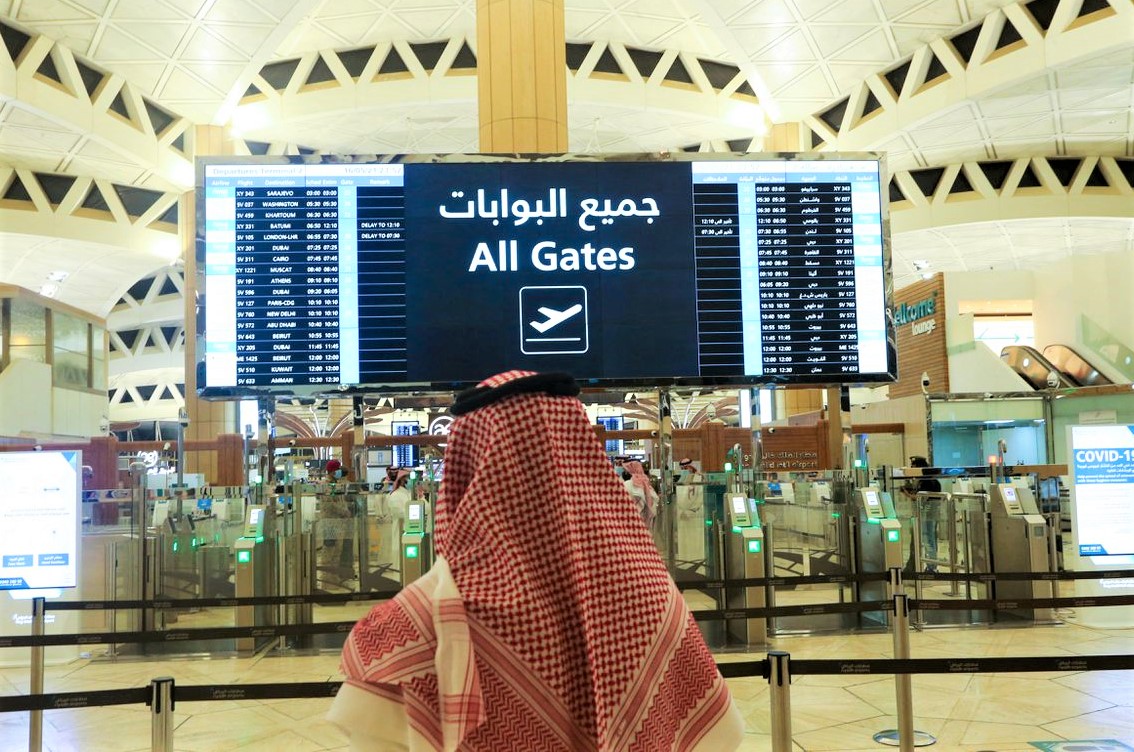 File photo: A man checks the flight timings at the King Khalid International Airport in Riyadh, Saudi Arabia, May 16, 2021. (REUTERS/Ahmed Yosri)