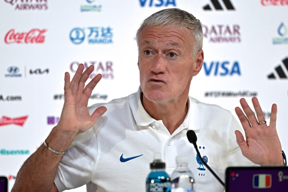 France's coach Didier Deschamps attends a press conference at the Qatar National Convention Center (QNCC) in Doha on November 29, 2022, on the eve of the Qatar 2022 World Cup football match between Tunisia and France. (Photo by FRANCK FIFE / AFP)