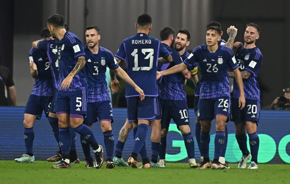 Argentina's Julian Alvarez celebrates scoring their second goal with teammates during the FIFA World Cup Qatar 2022 Group C match against Poland at the Stadium 974, Doha, Qatar, on November 30, 2022  Reuters/Dylan Martinez