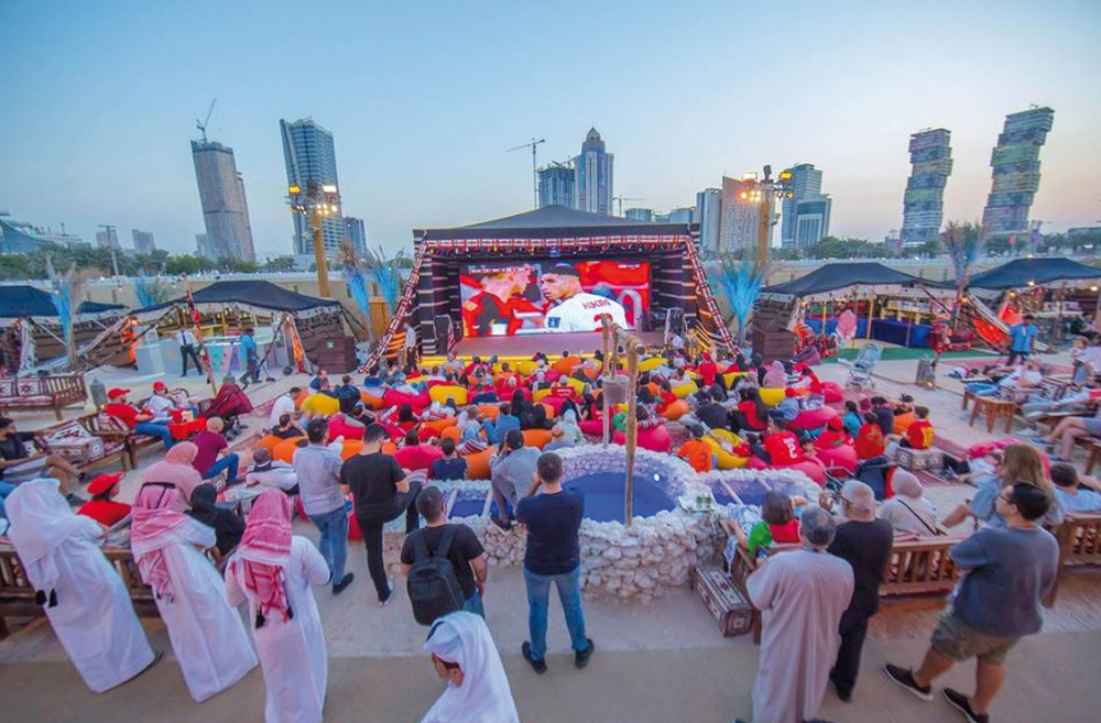 Visitors watching a live football match at the Arabian Nights Lusail.