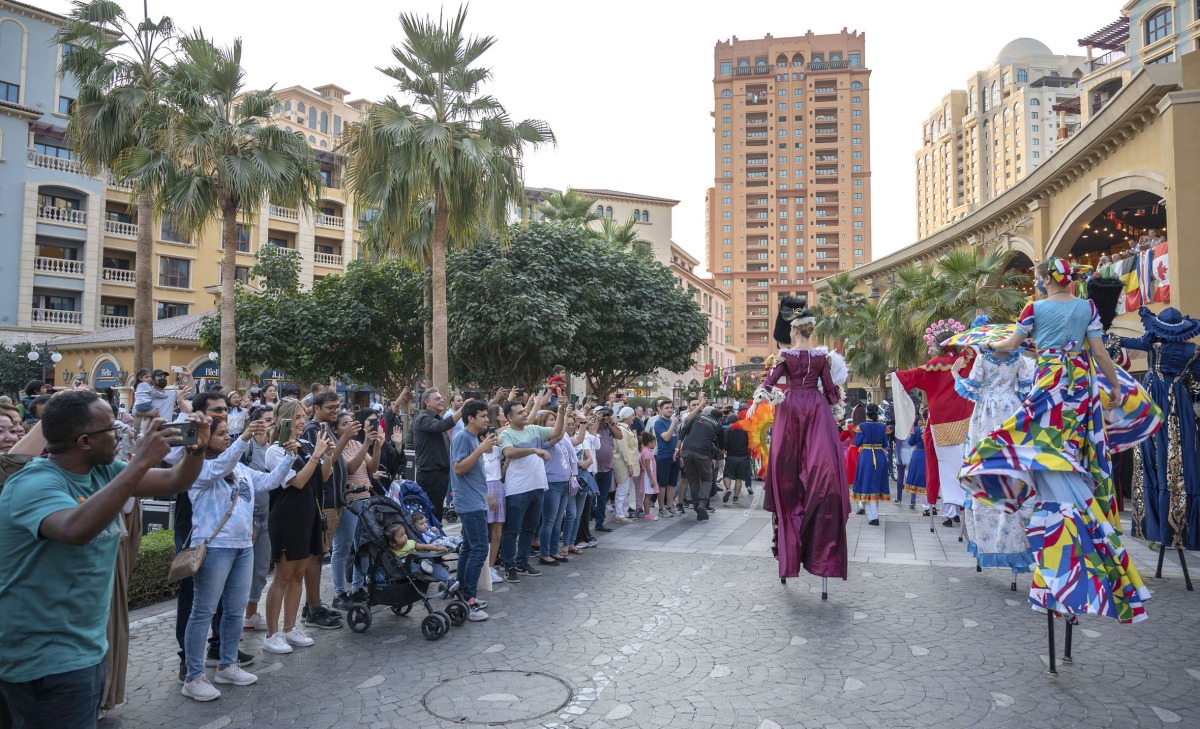 Visitors enjoy World Cup festivities at The Pearl-Qatar. 